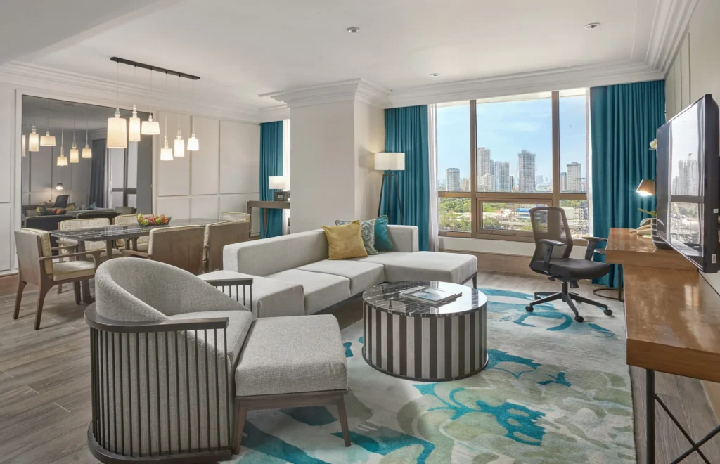 Livingroom of two bedroom suite in Holiday inn Manila Galleria interior photo